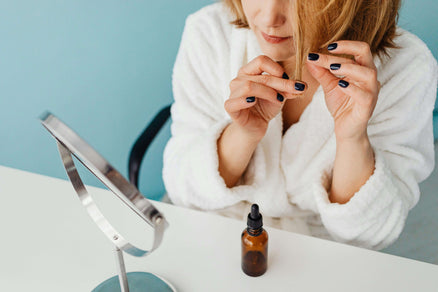 Woman using hair oil