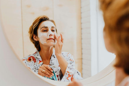 woman doing skincare for natural anti-aging