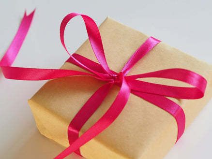 gift box with pink ribbon