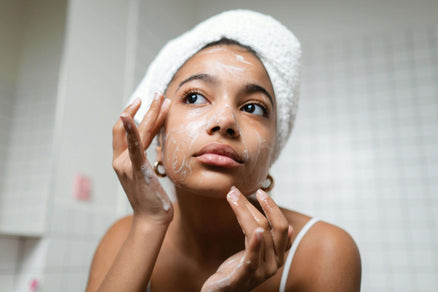 Woman washing face for simple night skincare routine