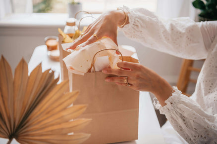 woman opening gifts