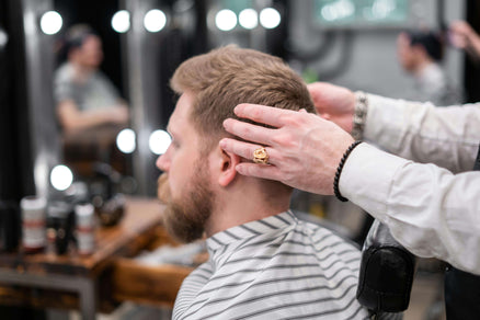 Man at the barber for hair care