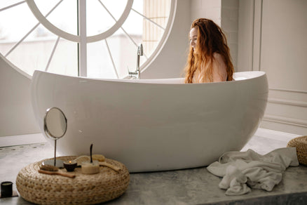 woman taking a bath during winter
