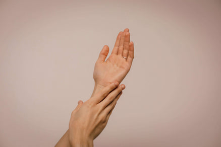 woman's hands representing skincare